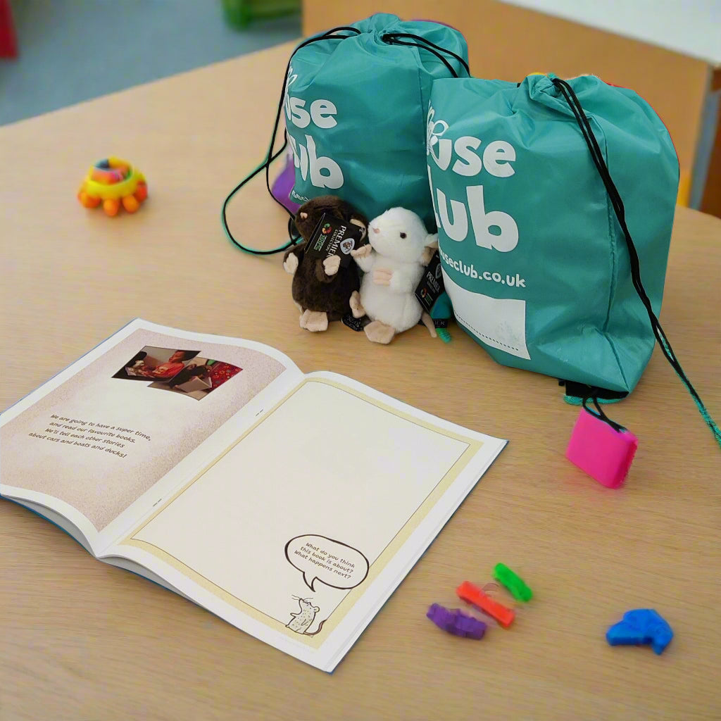 Teal Mouse Club bags, toy mice and My Very Own Mouse workbooks.